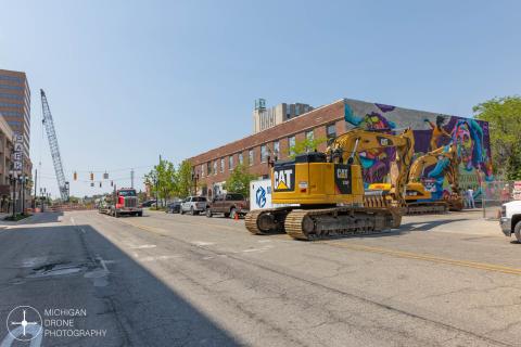 View looking south on Grand Ave as the Tower on Grand, part of New Vision Lansing, is being constructed. New project from Granger Group at Walter Neller building is on the right.